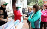Khách du lịch đeo khẩu trang phòng virus corona, khám phá Thủ đô Hà Nội